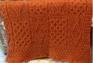Picture of Pure wool knitted blanket - Burnt Orange