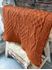 Picture of Pure wool knitted blanket - Burnt Orange